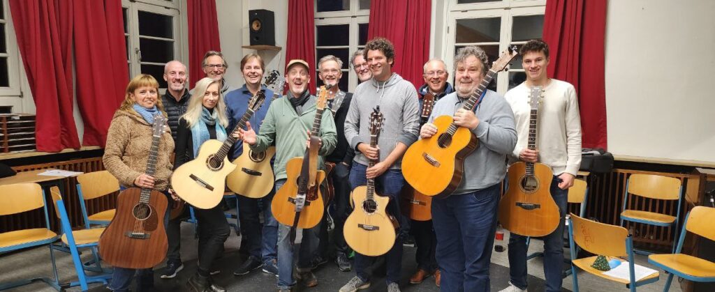 Adam Rafferty and students at a guitar retreat